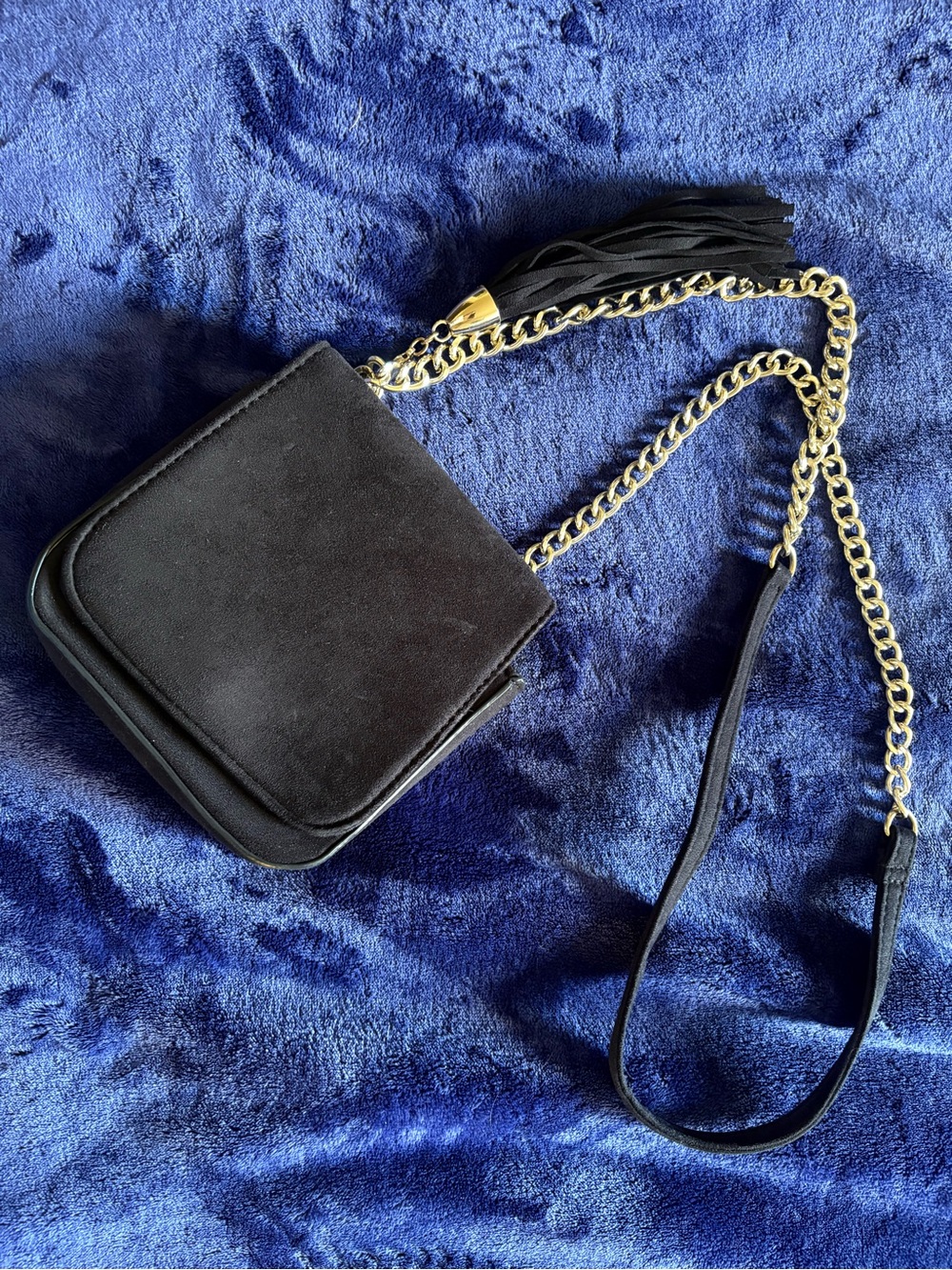 Black Suede Crossbody with Gold Chain and Tassel Accent